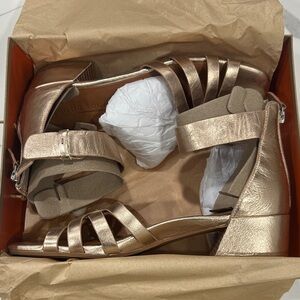 Gentle Souls Rose Gold break my park sandals.